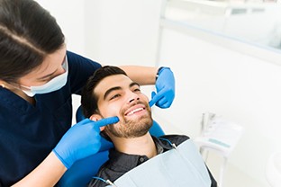 a patient having his smile checked