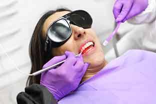 laser periodontal treatment can help remove damaged gum tissue without the need for sutures