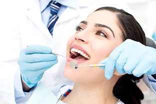 Closeup of woman smiling during dental checkup