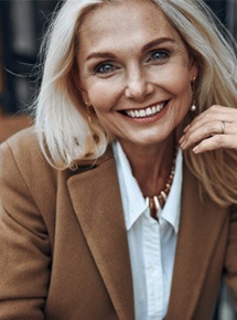 Woman smiling after teeth whitening