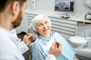 patient speaking to a dentist