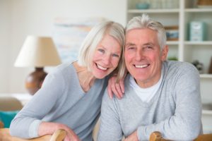 elderly couple smiling