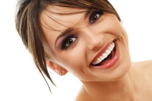 woman smiling with porcelain veneers in Peabody