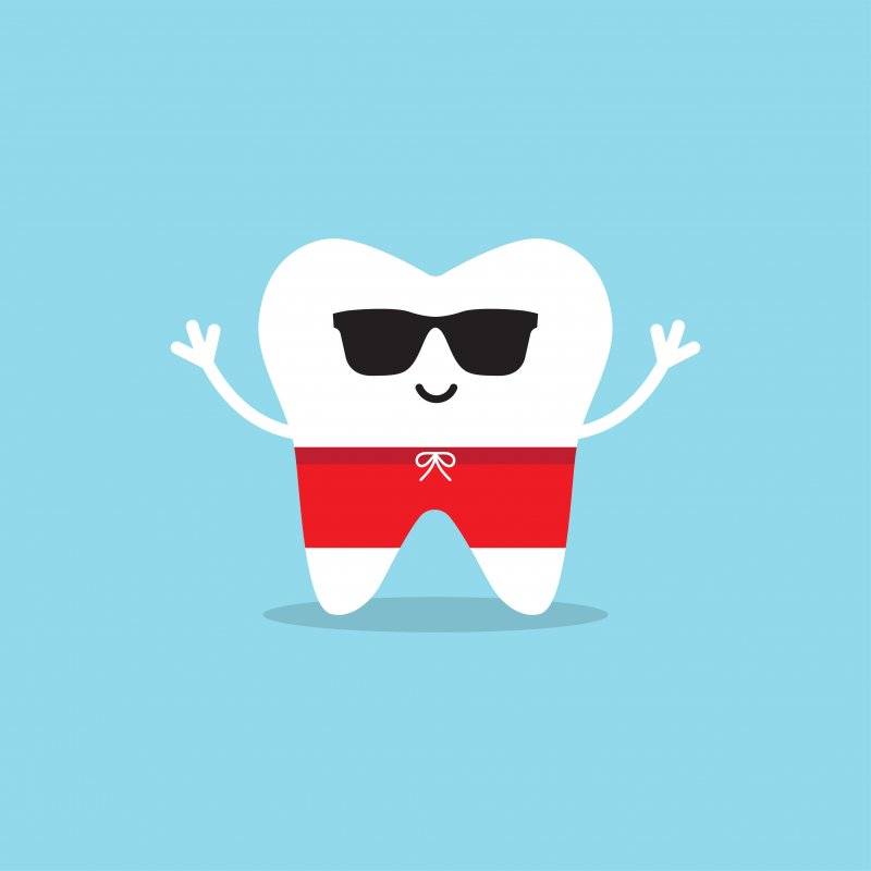 Tooth wearing sunglasses and swim trunks