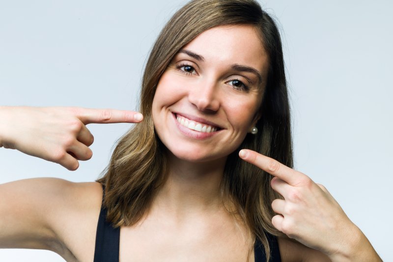Woman smiling after gum recontouring