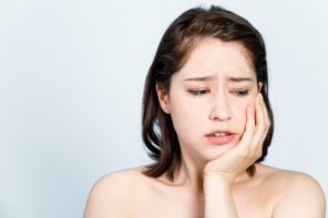 Woman with facial pain